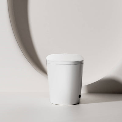 Prime smart toilet with the lid open, showing the rimless wash bowl