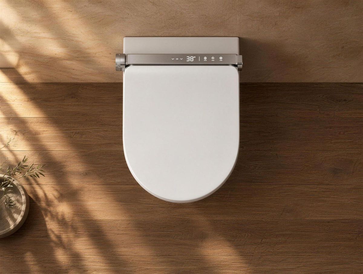 Top-down view of the Tresani Clair white wall-hung smart toilet floating above a warm oak floor