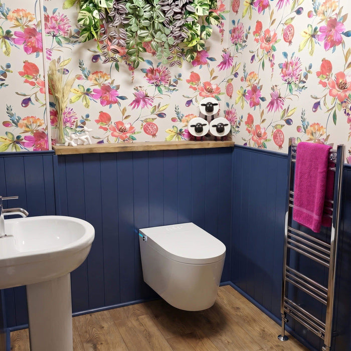 Customer photo — wall-hung Tresani with floral wallpaper